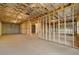 Unfinished basement featuring concrete floors, exposed wooden beams, and framed walls at 739 Marlay Sw Ln, Powder Springs, GA 30127