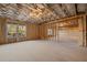 Large unfinished basement with windows offering natural light and exposed wooden beams at 739 Marlay Sw Ln, Powder Springs, GA 30127