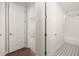 Hallway view of a bathroom with stylish tile flooring and modern fixtures at 739 Marlay Sw Ln, Powder Springs, GA 30127