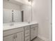 Bathroom featuring double sink vanity with ample storage at 739 Marlay Sw Ln, Powder Springs, GA 30127