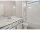 Well-lit bathroom with vanity, commode and a shower/tub featuring bright white subway tile at 739 Marlay Sw Ln, Powder Springs, GA 30127