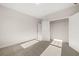 Clean, empty bedroom with large closet, plush carpeting, and two doors at 739 Marlay Sw Ln, Powder Springs, GA 30127