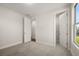 Bedroom featuring carpet and windows at 739 Marlay Sw Ln, Powder Springs, GA 30127