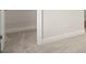Bedroom featuring neutral carpet and an open closet area for storage at 739 Marlay Sw Ln, Powder Springs, GA 30127
