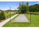 An inviting bocce ball court surrounded by lush green grass, perfect for outdoor recreation and community engagement at 739 Marlay Sw Ln, Powder Springs, GA 30127