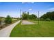 A bocce ball court surrounded by lush green grass, perfect for outdoor recreation and community engagement at 739 Marlay Sw Ln, Powder Springs, GA 30127