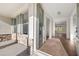 Welcoming foyer with hardwood floors, transom windows, and natural light at 739 Marlay Sw Ln, Powder Springs, GA 30127