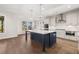 Modern kitchen with a large island, stainless steel appliances, and ample counter space at 739 Marlay Sw Ln, Powder Springs, GA 30127