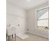 Bright laundry room with utility sink at 739 Marlay Sw Ln, Powder Springs, GA 30127