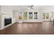 Open living room features a fireplace, and generous natural light at 739 Marlay Sw Ln, Powder Springs, GA 30127