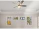 Main bedroom featuring natural light from several windows and a modern ceiling fan at 739 Marlay Sw Ln, Powder Springs, GA 30127