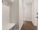 Mud room features bench and entrance to bathroom at 739 Marlay Sw Ln, Powder Springs, GA 30127