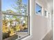The exterior view of the neighborhood from a window lined hallway at 739 Marlay Sw Ln, Powder Springs, GA 30127