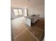 Spacious kitchen island with granite countertops and stainless steel sink at 11602 E Lovejoy Rd, Hampton, GA 30228