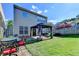 Serene backyard with a gazebo, a patio, and lush greenery offers an inviting space for outdoor enjoyment at 2505 Thackery Ct, Cumming, GA 30041