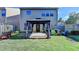 Spacious backyard features a patio, gazebo, and a green lawn, perfect for outdoor gatherings and relaxation at 2505 Thackery Ct, Cumming, GA 30041