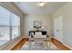 Bright office with natural light, stylish desk, and ample storage in the closet at 2505 Thackery Ct, Cumming, GA 30041