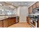 Bright kitchen with a breakfast bar, stainless steel appliances, and pendant lighting at 2505 Thackery Ct, Cumming, GA 30041