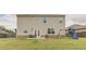 Spacious backyard with patio and swing set at 3868 Sweet Iris Cir, Loganville, GA 30052