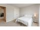 Cozy bedroom featuring a plush bed with white linens and a side table with modern lamp at 3868 Sweet Iris Cir, Loganville, GA 30052