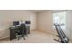 Bedroom with desk area and natural light from the window at 3868 Sweet Iris Cir, Loganville, GA 30052