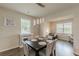 Dining room featuring decorative lighting and wood floors at 3868 Sweet Iris Cir, Loganville, GA 30052