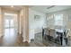Hallway view showing a dining room and doorway access at 3868 Sweet Iris Cir, Loganville, GA 30052