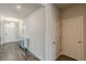 Hallway with entry door, and decoratively appointed sideboard at 3868 Sweet Iris Cir, Loganville, GA 30052