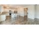Modern kitchen featuring granite countertops, stainless steel appliances, and an island with seating at 3868 Sweet Iris Cir, Loganville, GA 30052