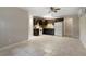 Eat-in kitchen features tiled flooring and modern appliances in a neutral palette at 102 River Oaks Dr, Woodstock, GA 30188