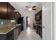 Sleek kitchen featuring stainless steel appliances, granite countertops, and tiled floors at 102 River Oaks Dr, Woodstock, GA 30188
