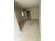 Bedroom with two closets and an open door, providing a spacious place to rest at 11604 E Lovejoy Rd, Hampton, GA 30228