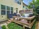 Exterior deck includes outdoor furniture, storage and access to an easily maintained yard at 1263 Linden Ne Ct, Atlanta, GA 30329