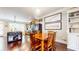 Dining area with hardwood flooring, designer lighting and nearby kitchen at 1263 Linden Ne Ct, Atlanta, GA 30329