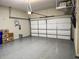 Spacious garage with epoxy floor, overhead storage, and room for multiple vehicles at 1263 Linden Ne Ct, Atlanta, GA 30329