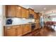 Bright kitchen with wood cabinets, granite countertops, and stainless steel appliances at 1263 Linden Ne Ct, Atlanta, GA 30329