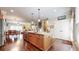 Spacious kitchen with island, hardwood floors, and open layout to dining and living areas at 1263 Linden Ne Ct, Atlanta, GA 30329