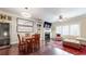 Open living area featuring a wine fridge, TV, fireplace and dining area at 1263 Linden Ne Ct, Atlanta, GA 30329
