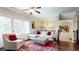Cozy living room with a plush sofa and ample natural light at 1263 Linden Ne Ct, Atlanta, GA 30329