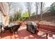 Back deck with patio furniture and grill that's perfect for outdoor relaxation and dining at 2269 Howell Farms Nw Trl, Acworth, GA 30101