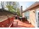 View of a spacious back deck with outdoor seating and a grill at 2269 Howell Farms Nw Trl, Acworth, GA 30101
