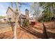 The backyard features a red deck, a privacy fence, and plenty of room to enjoy the outdoors at 2269 Howell Farms Nw Trl, Acworth, GA 30101