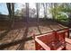 Fenced backyard and deck provide an inviting outdoor living space at 2269 Howell Farms Nw Trl, Acworth, GA 30101