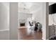 Bright bedroom featuring hardwood floors, fireplace, and a separate office area at 2269 Howell Farms Nw Trl, Acworth, GA 30101