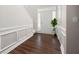 Bright foyer with hardwood flooring, decorative wall panels, and natural light at 2269 Howell Farms Nw Trl, Acworth, GA 30101