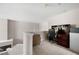 A loft area with neutral paint and carpeting, plus a desk for use as an office at 2269 Howell Farms Nw Trl, Acworth, GA 30101