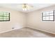 Bedroom featuring a ceiling fan and natural light from the windows at 2585 Whisper Trail, Douglasville, GA 30135