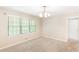 Bedroom featuring neutral carpet and large window at 2585 Whisper Trail, Douglasville, GA 30135