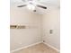 A quaint laundry room featuring linoleum floors, a ceiling fan, and a shelf perfect for organizing at 2585 Whisper Trail, Douglasville, GA 30135