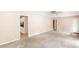 Spacious living room with neutral carpet and view to the kitchen at 2585 Whisper Trail, Douglasville, GA 30135